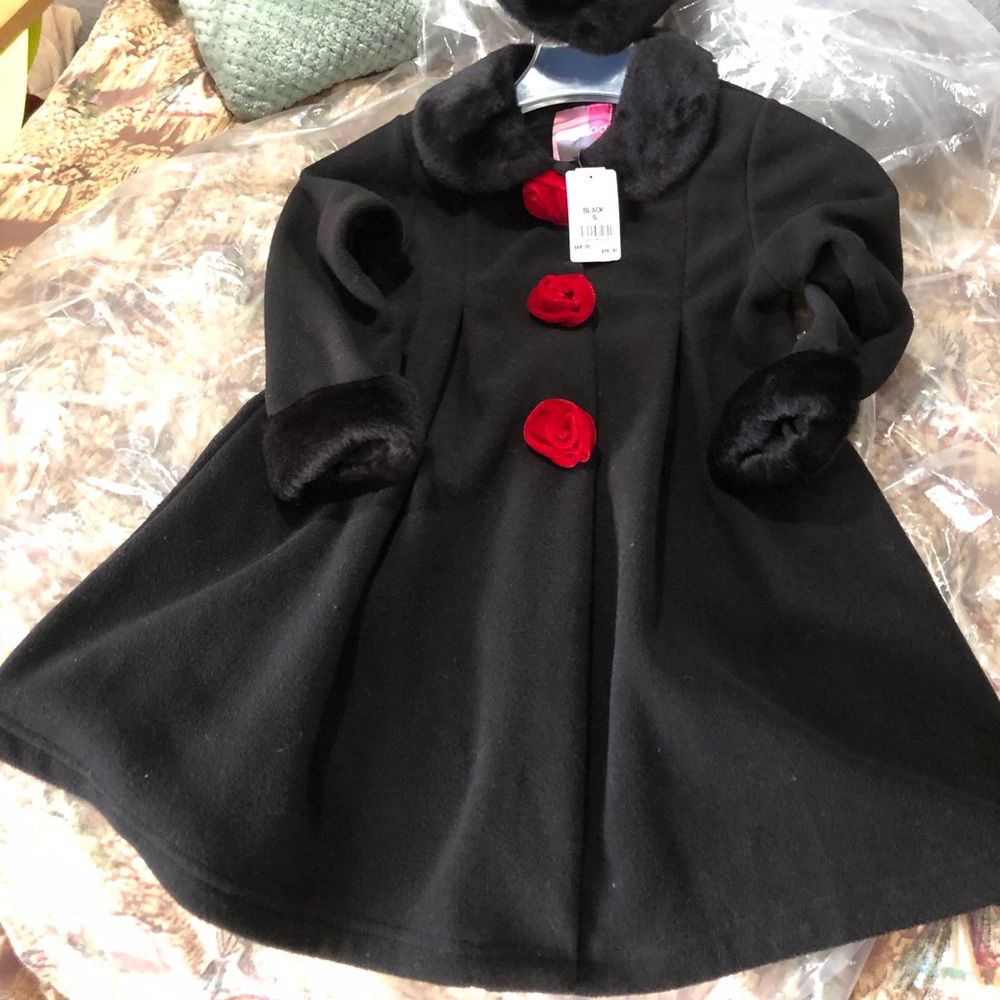 Child’s faux fur coat